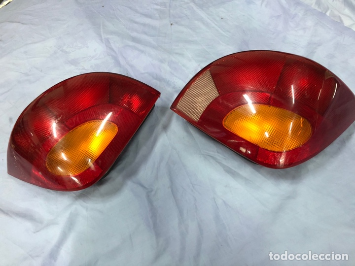 Autos und Motorr&auml;der: PILOTO TRASERO -FORD FIESTA 96