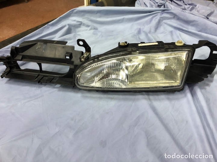 Autos und Motorr&auml;der: FARO FORD MONDEO 93-95 (derecho e izquierdo )