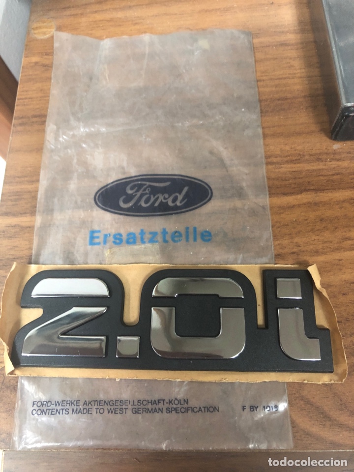 Autos und Motorr&auml;der: EMBLEMA FORD - 2. 0 i