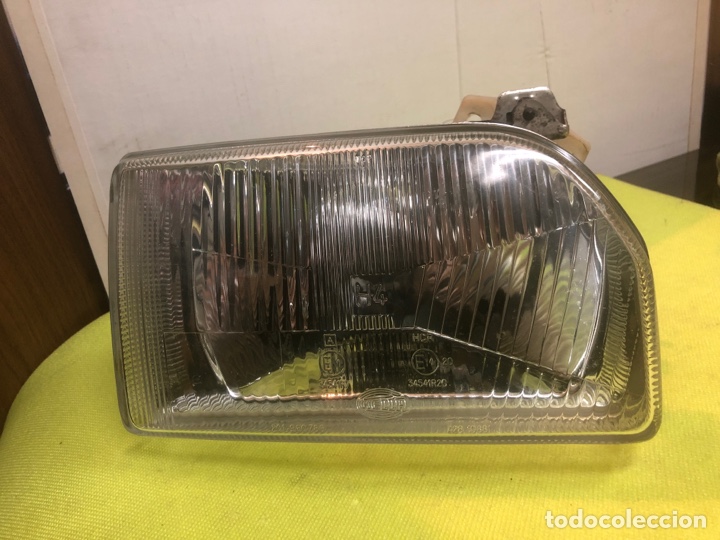 Autos und Motorr&auml;der: FARO DERECHO-FORD 86AG15K060 ( FORD ESCORT-ORION 86 )