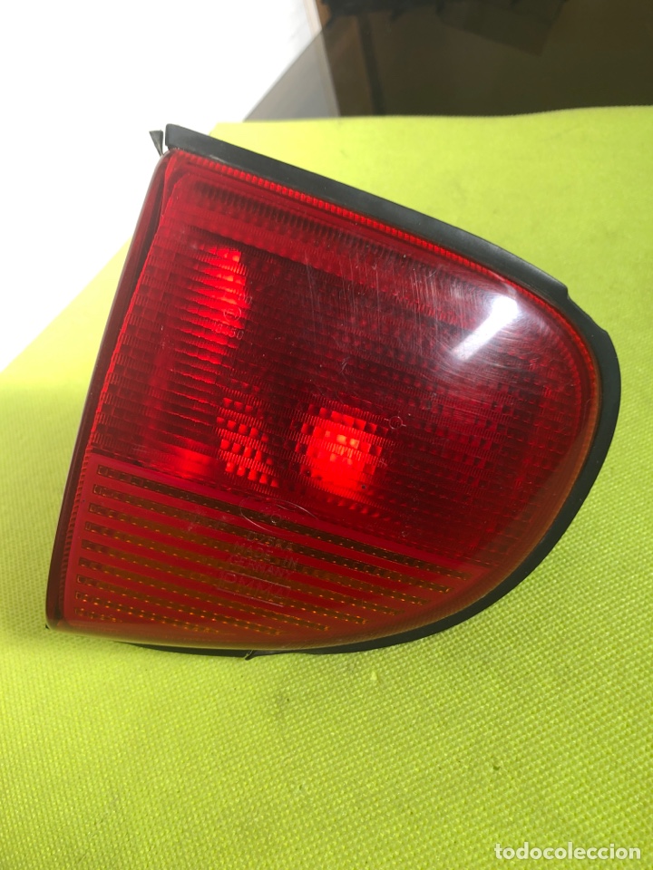 Autos und Motorr&auml;der: PILOTO TRASERO IZQUIERDO ( FORD ESCORT 93 )