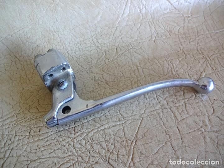 Coches y Motocicletas: antigua maneta de freno de moto con muelle motocicleta