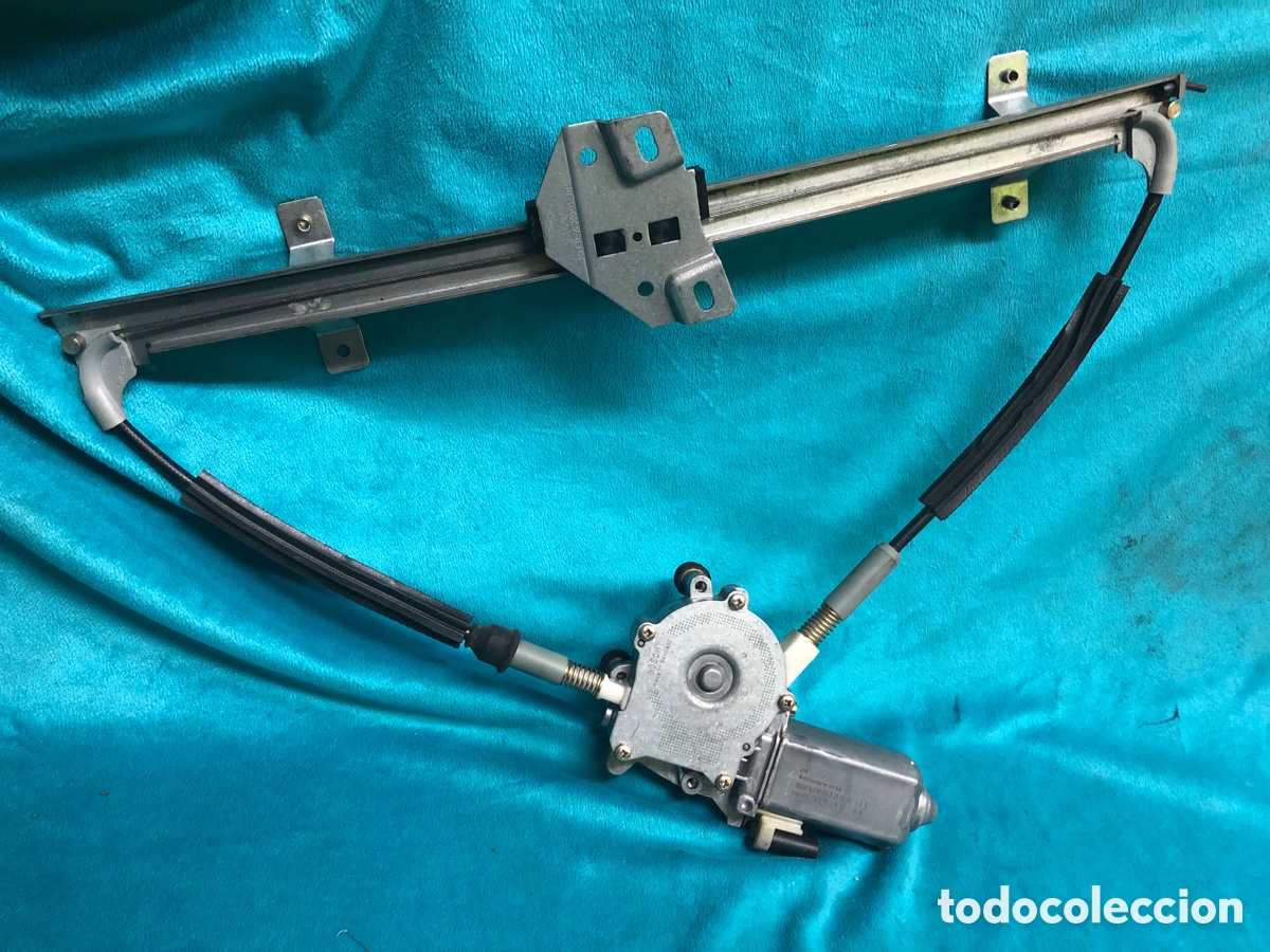 Autos und Motorr&auml;der: ELEVALUNAS DELANTERO IZQUIERDO- 89FBA23201 (FORD FIESTA 89 XR2 i )