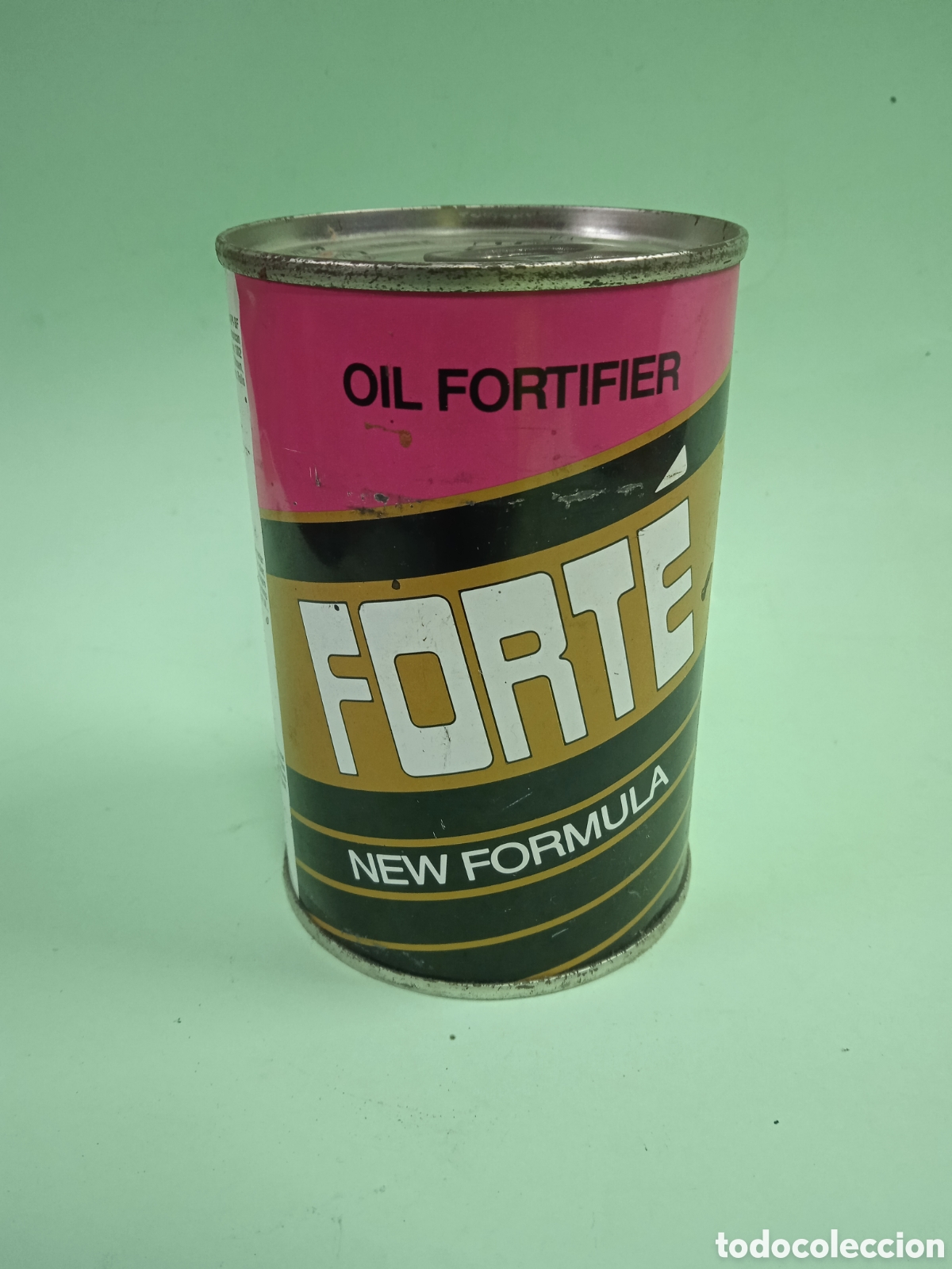 Autos und Motorr&auml;der: Antigua lata de Fort&eacute; Oil Fortifier coche
