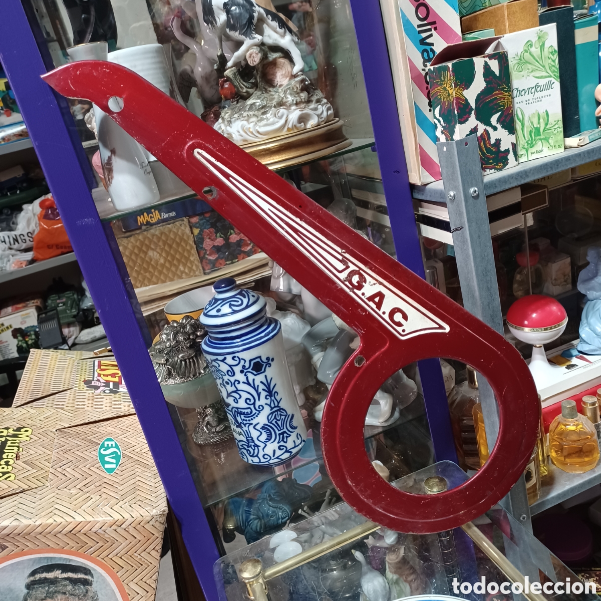 Autos und Motorr&auml;der: Antiguo cubrecadenas GAC G.A.C.