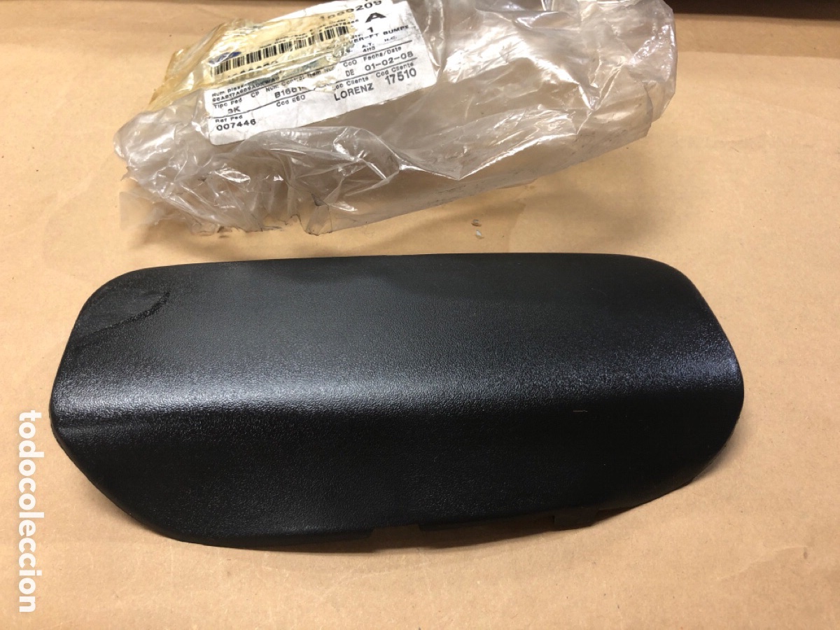 Autos und Motorr&auml;der: CUBIERTA PARACHOQUES DELANTERO GANCHO DE REMOLCAR- 1099209 ( FORD ESCORT 95-2001 )