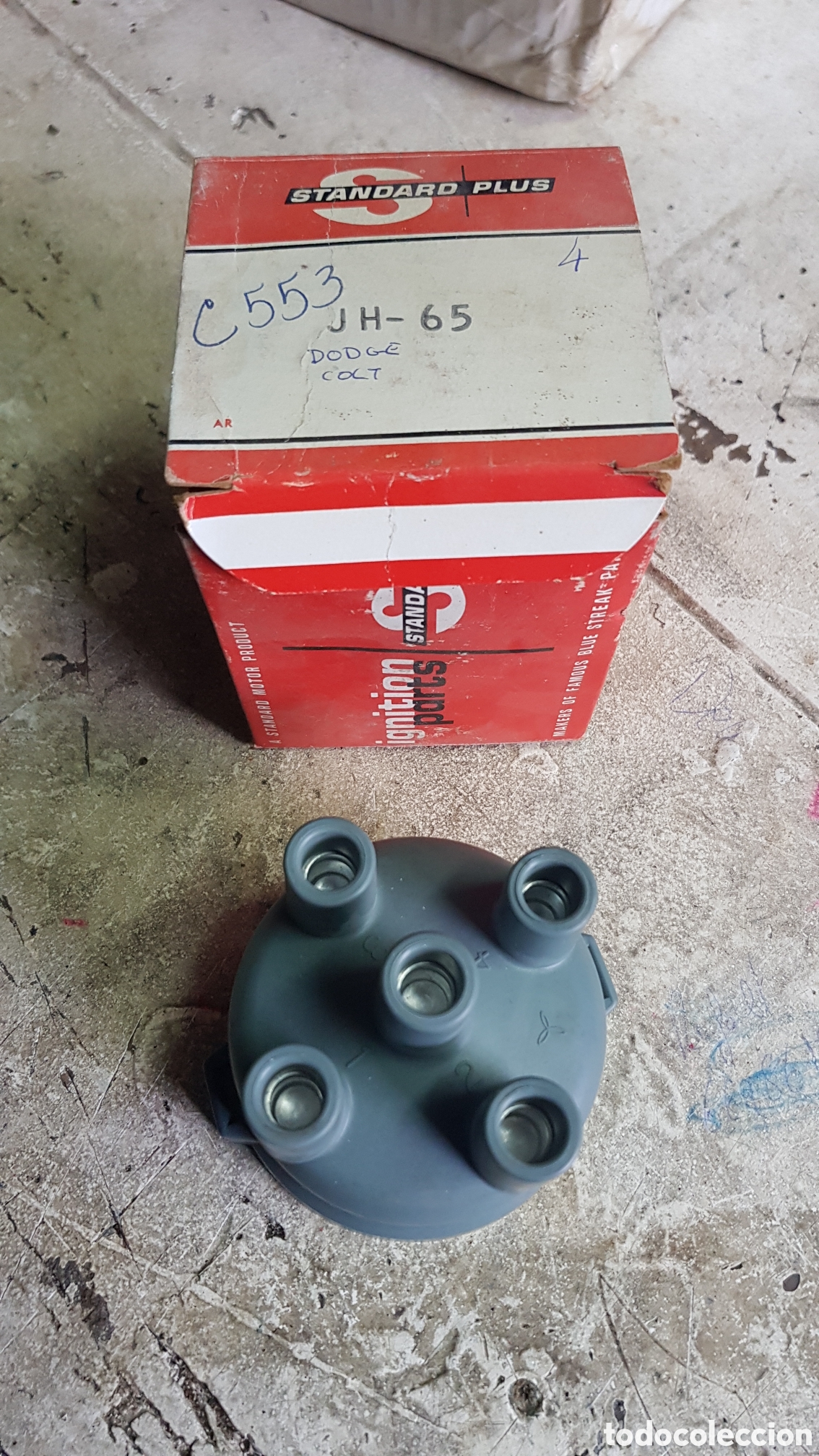 Autos und Motorr&auml;der: Tapa delco Dodge Colt