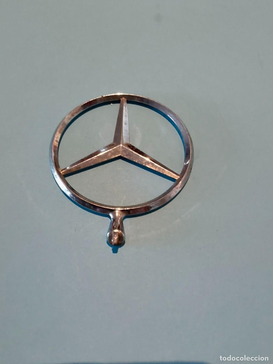 Coches y motocicletas: Estrella Mercedes.Signo identificatibo.de la marca.