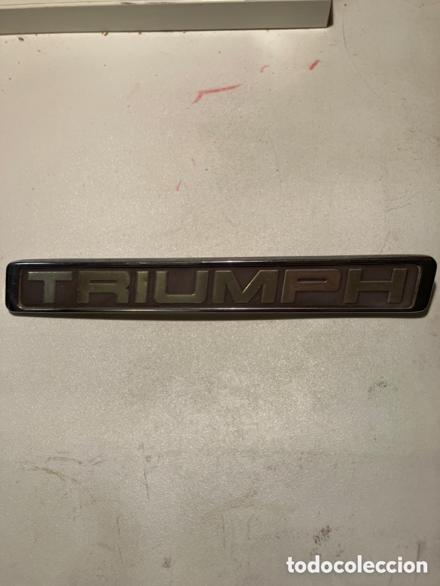 Automobili e Motociclette: Anagrama Triumph metalico