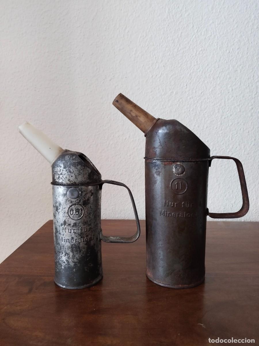 Voitures et Motocyclettes: Pareja de Aceiteras Motor. Nur f&uuml;r Mineraloel. 0,5 y 1 litro.