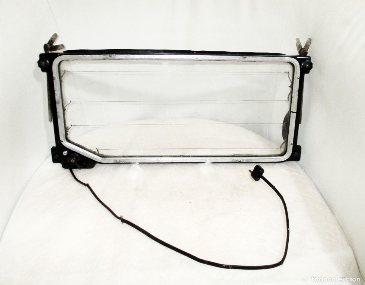 Coches y Motocicletas: ANTIGUA LUNETA T&Eacute;RMICA A 6 Y 12 VOLTIOS. MARCA NIRONA. PARA AUTOS CL&Aacute;SICOS.