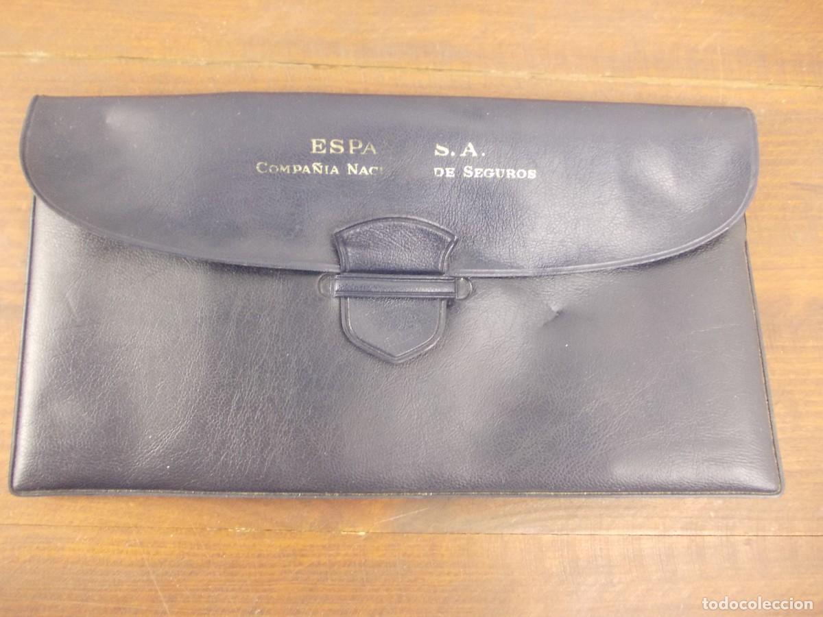 Coches y Motocicletas: Cartera portadocumentos Espa Compa&ntilde;&iacute;a Nacional de Seguros publicidad azul papeles coche cl&aacute;sico