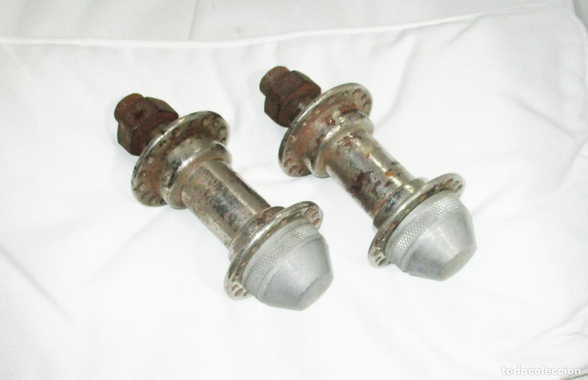 Coches y Motocicletas: PAREJA DE BUJES DE MOTOCICLETA ANTIGUA SIN IDENTIFICAR. 36 AGUJEROS.