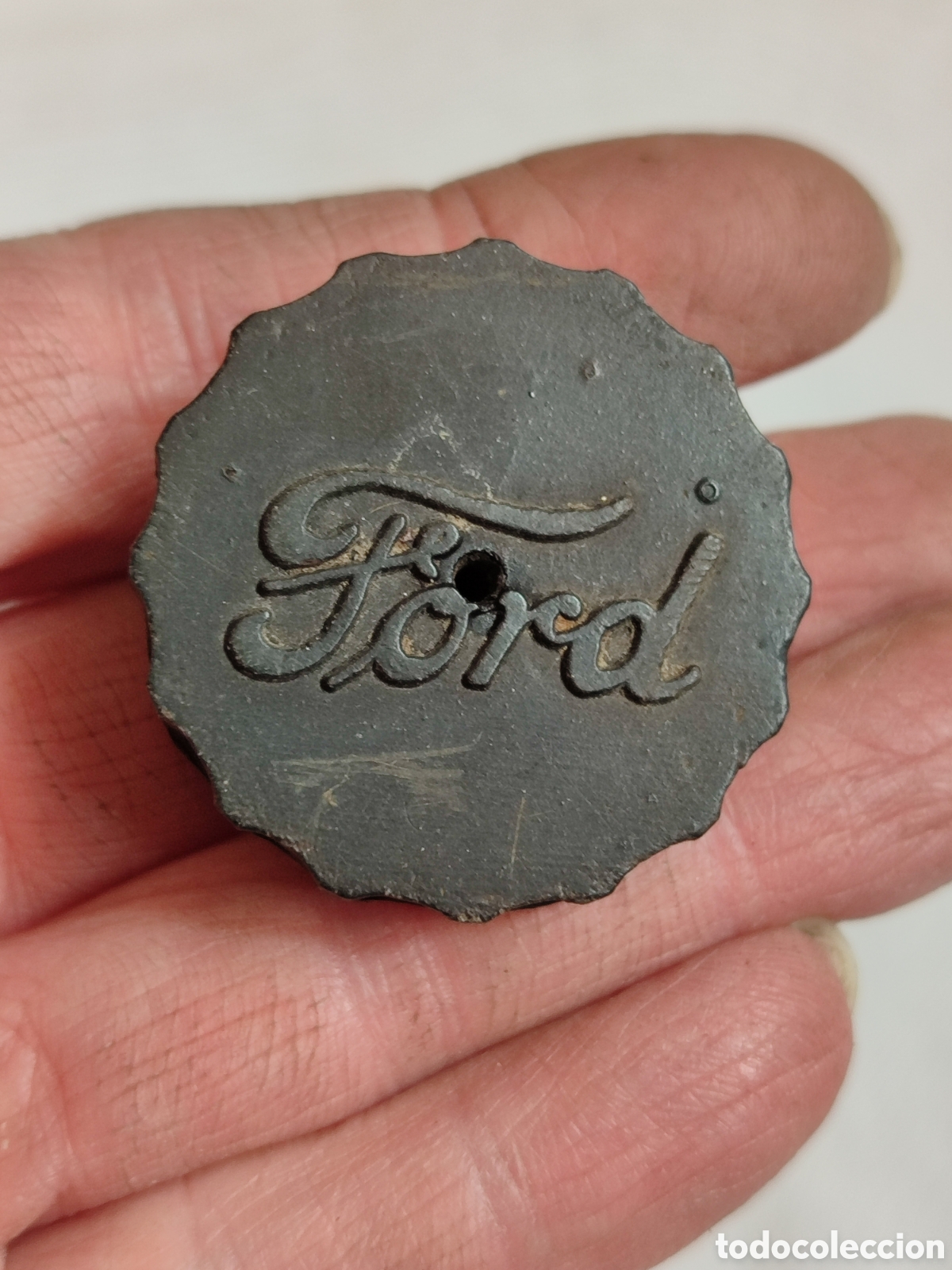Coches y Motocicletas: Ford.antiguo tap&oacute;n Ford