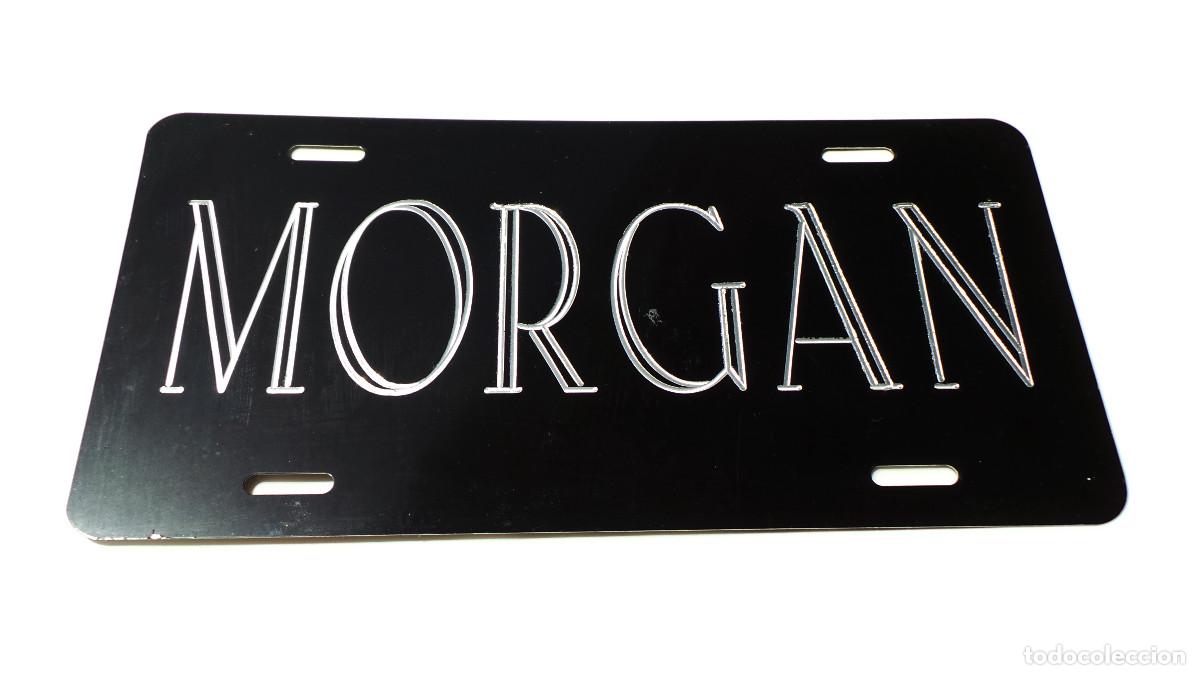 Coches y Motocicletas: ESTA ES UNA PLACA DE MATR&Iacute;CULA DECORATIVA DE ALUMINIO NEGRO CON MORGAN EN BLANCO.