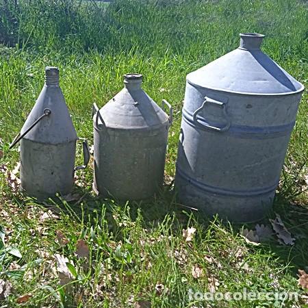 Carros e motociclos: Garrafas antiguas de aceite met&aacute;licas (3)