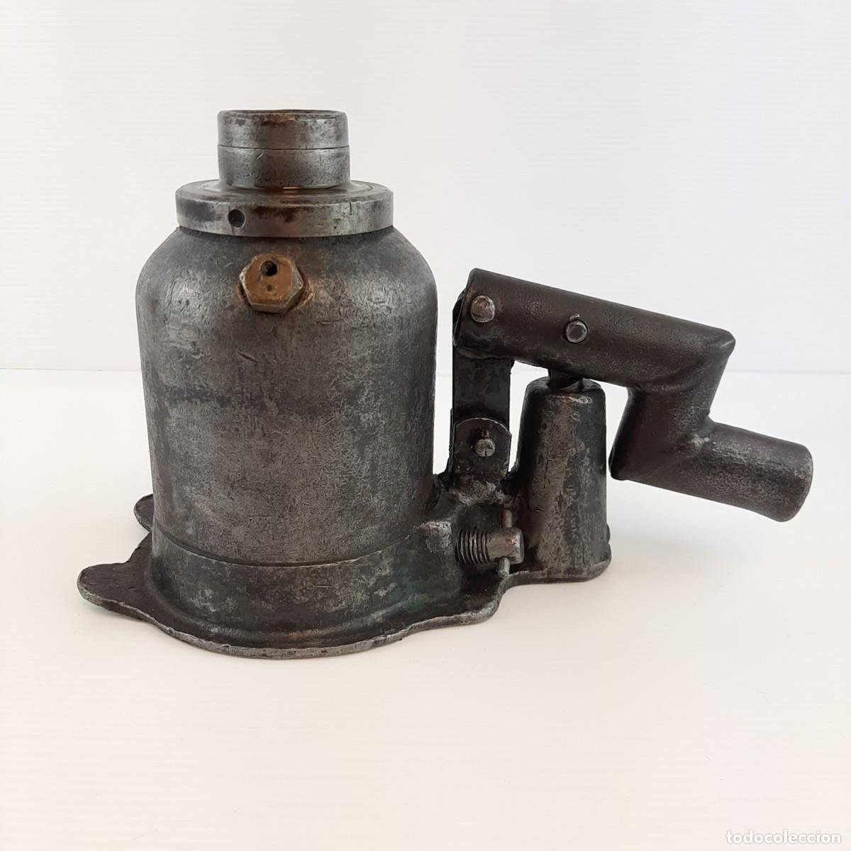 Coches y motocicletas: Gato hidr&aacute;ulico de botella antiguo (mediados del siglo XX)- martinetto idraulico