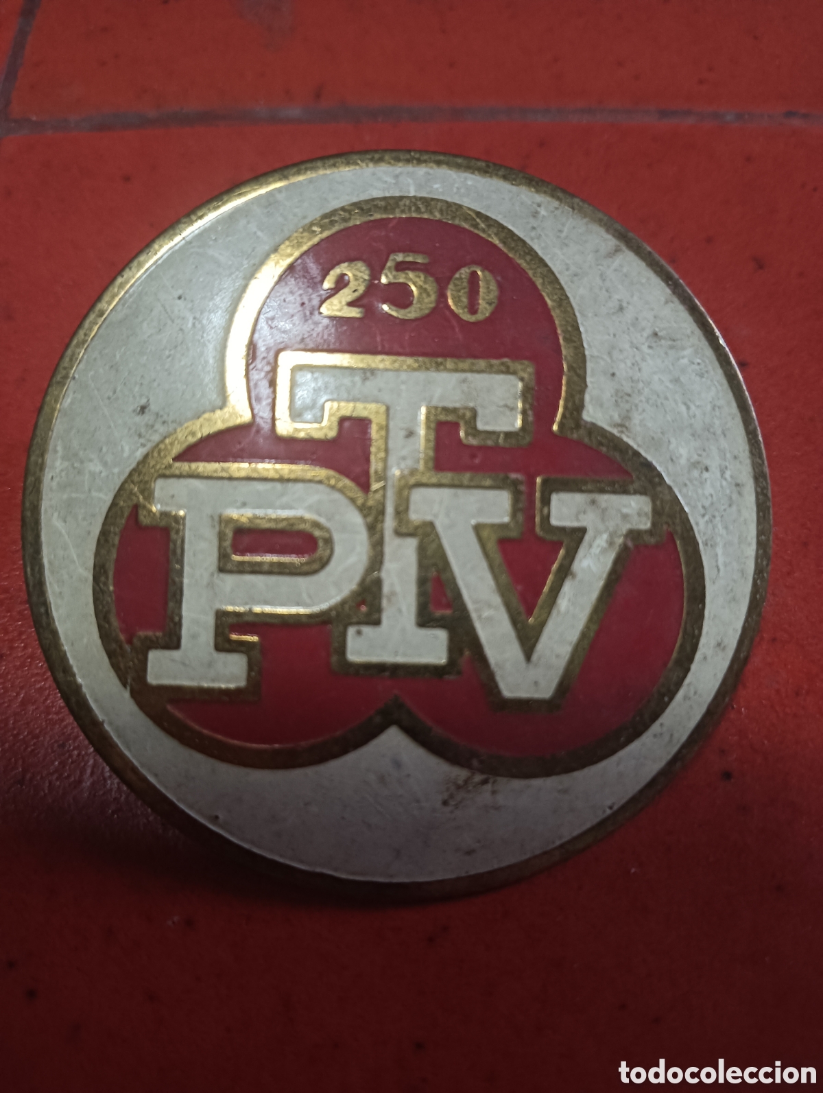 Coches y motocicletas: Antigua chapa esmaltada de PTV 250