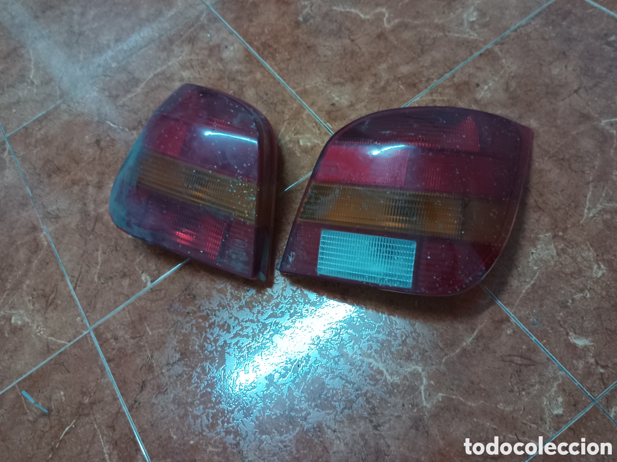 Coches y motocicletas: Ford fiesta III pilotos traseros
