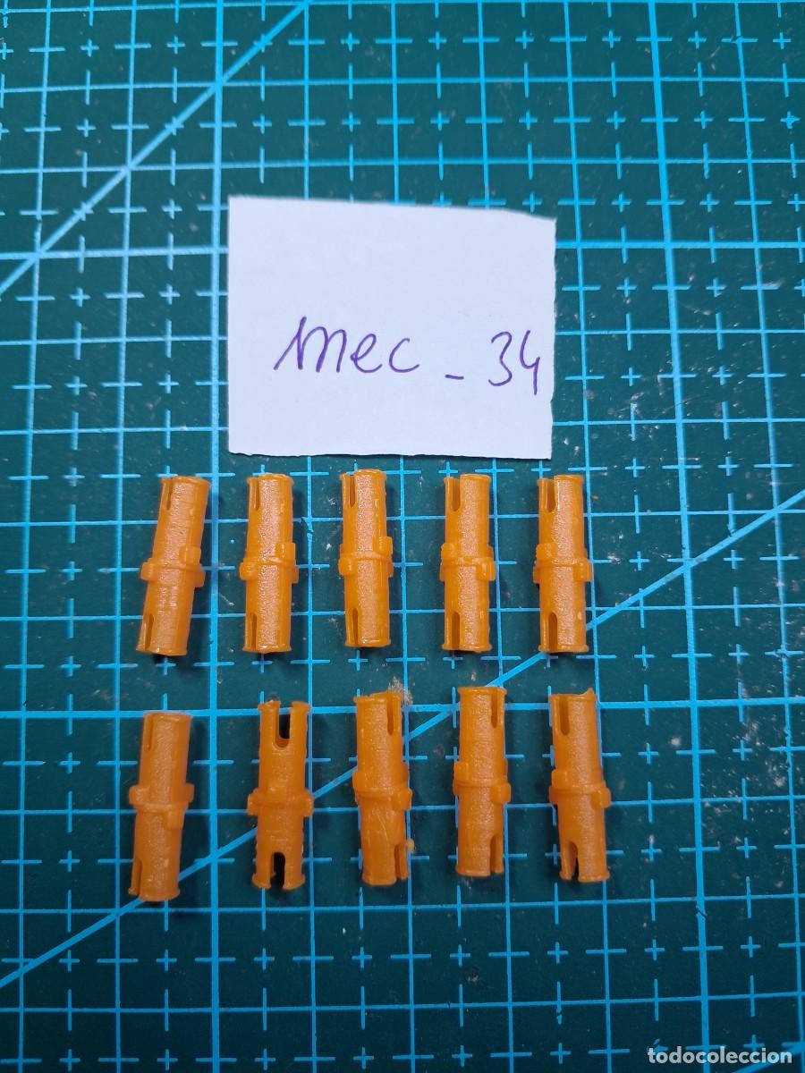 Pi&egrave;ces d&eacute;tach&eacute;es et composants: 10 Bulones o clavos de uni&oacute;n pl&aacute;stico naranja (19 mm) - Clementoni - Laboratorio de mec&aacute;nica