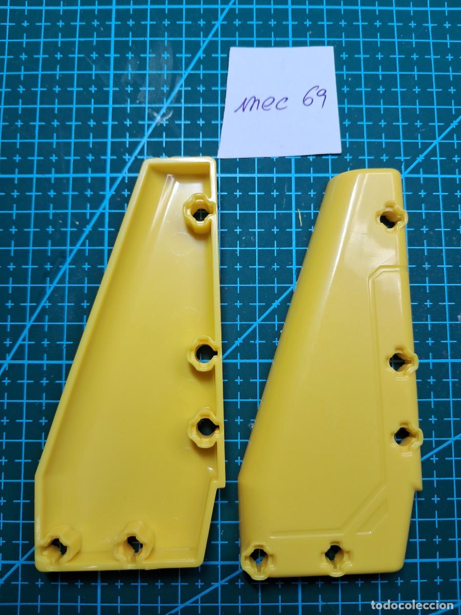 Repuestos y piezas: 2 Carcasas o paneles embellecedores pl&aacute;stico amarillo (99 x 44 mm) - Clementoni - Laboratorio de mec