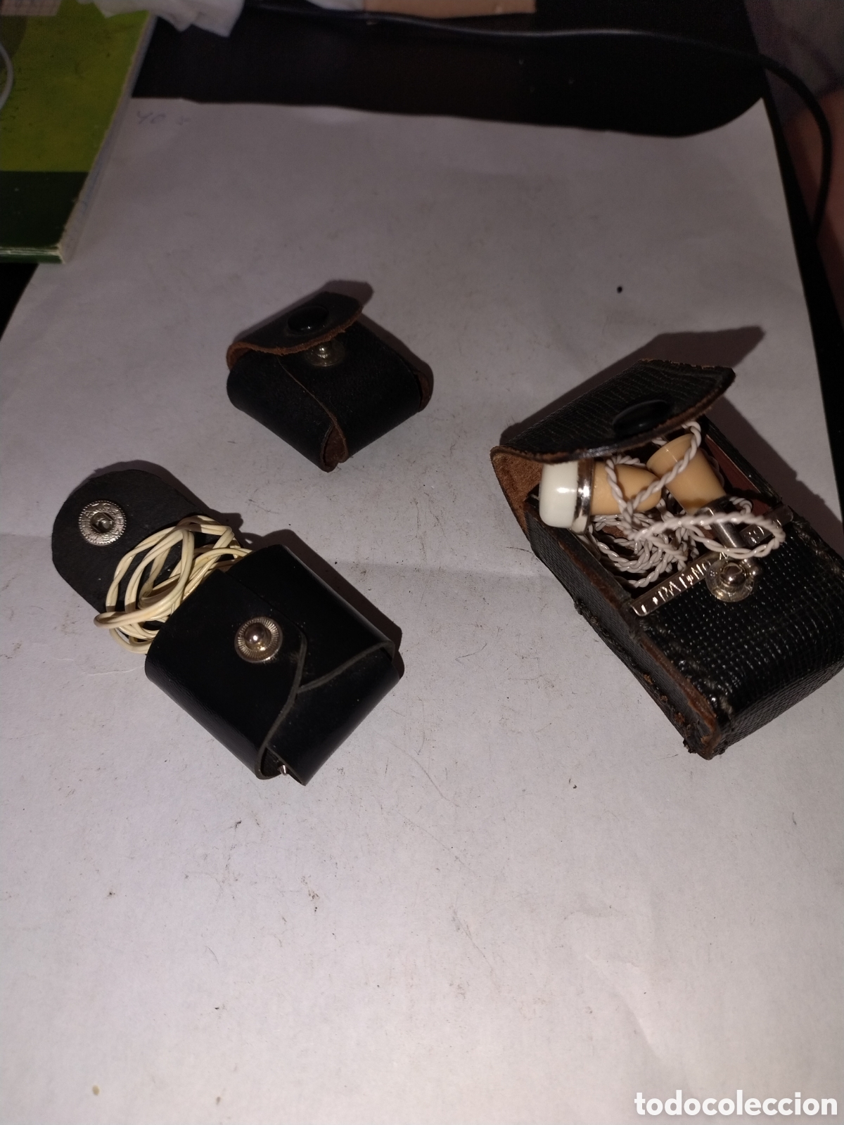 Radios antiguas: Tres fundas con auriculares