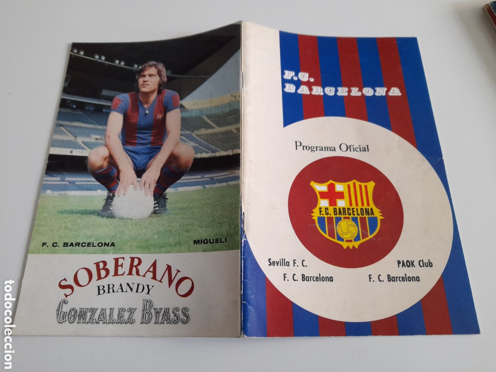 Coleccionismo deportivo: ANTIGUO PROGRAMA OFICIAL DEL F.B. BARCELONA. SEVILLA. PAOK SALONICA. MIGUELI. A&Ntilde;O 1975