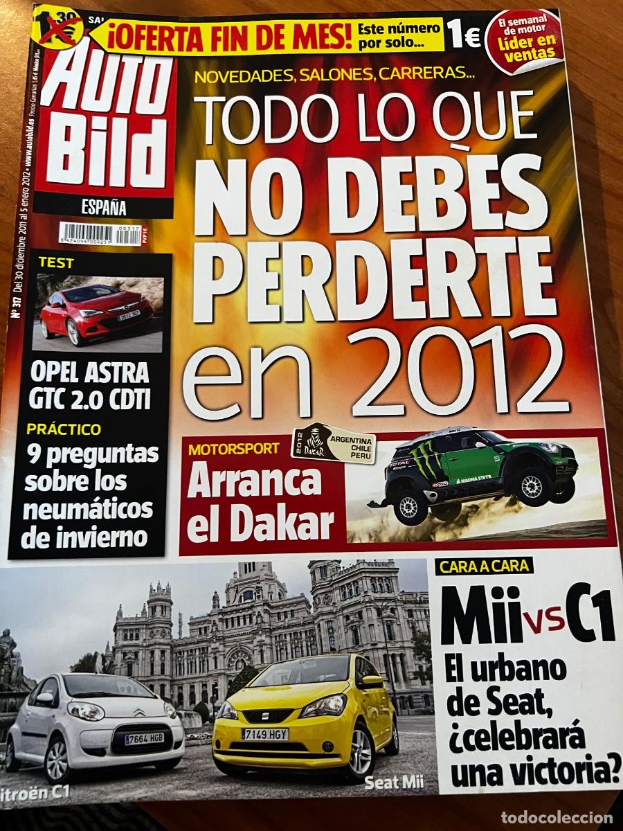 Coches: AUTO BILD. N&deg; 317. ENERO 2012. ARRANCA EL DAKAR. OPEL ASTRA GTC 2.0 CDTI. MII VS C1. LEER.