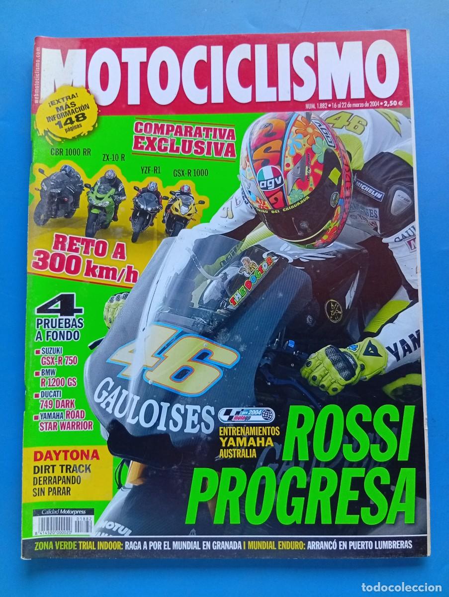 Coches y motocicletas: MOTOCICLISMO. N&ordm; 1882. MARZO 2004. ROSSI PROGRESA. DAYTONA DIRT TRACK DERRAPANDO SIN PARAR.... LEER.