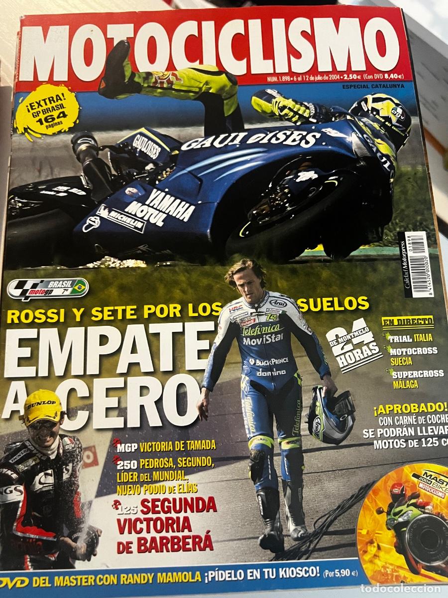 Coches y motocicletas: MOTOCICLISMO. N&deg; 1898. JULIO 2004. ROSSI Y SETE POR LOS SUELOS. 125 SEGUNDA VICTORIA DE BARBERA.