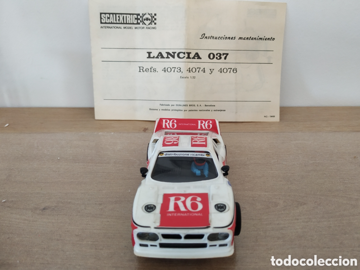 Scalextric: Lancia 037 R6 dorsal número 12 con luces delanteras más hoja de mantenimiento
