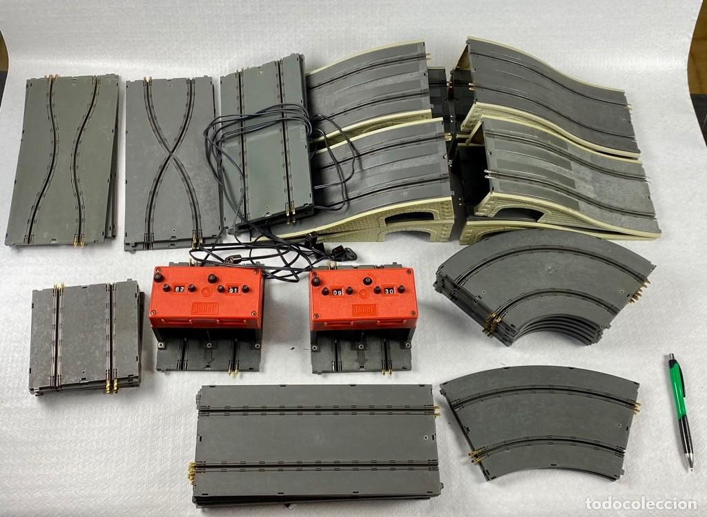 Scalextric: Complementos circuito Record 64 marca Jouef en muy buen estado.