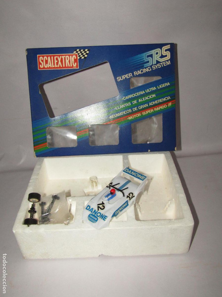 Scalextric: Antigua Caja Serie SRS de SCALEXTRIC EXIN con Carrocer&iacute;a LOLA T-298 DANONE