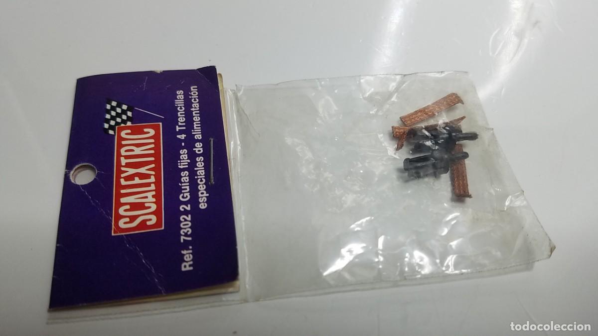 Scalextric: SLOT SCALEXTRIC EXIN SRS BLISTER BOLSA 2 GUIAS FIJAS NEGRAS - 4 TRENCILLAS ESPECIALES REF. 7302