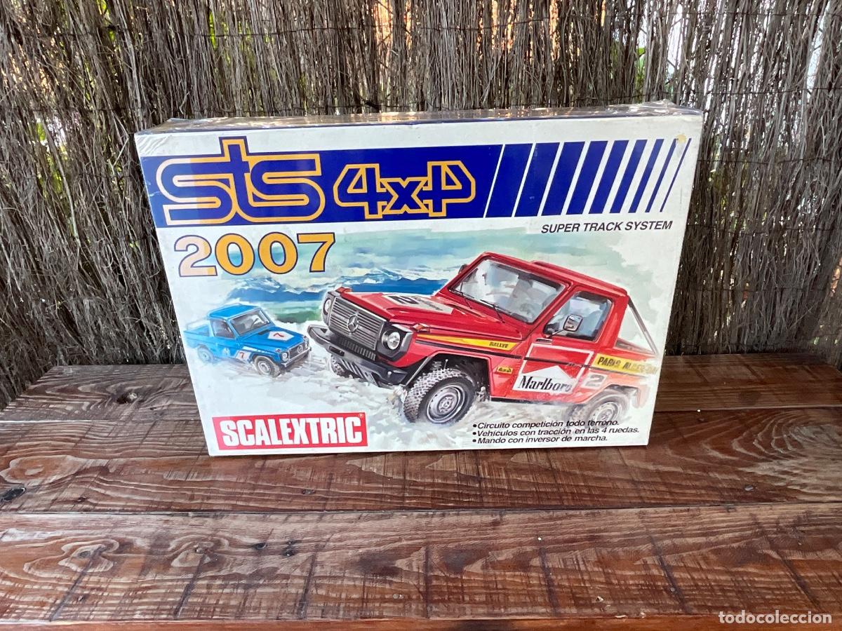 Scalextric: SCALEXTRIC CIRCUITO ATLAS 2007 STS 4x4-CAJA VAC&Iacute;A-ESTAN PROTEGIDA CON PL&Aacute;STICO-DECORACION SCALEXTRIC