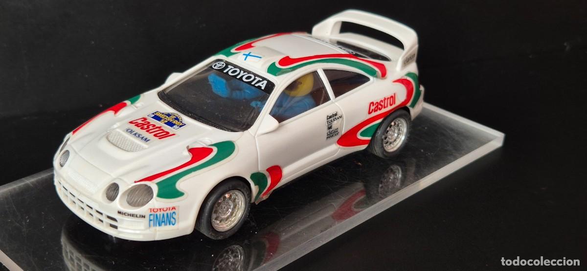 Scalextric: SCALEXTRIC TOYOTA COROLLA FUNCIONA REGULAR FALTA AJUSTAR BIEN, Y LUBRICAR EJES Y MOTOR