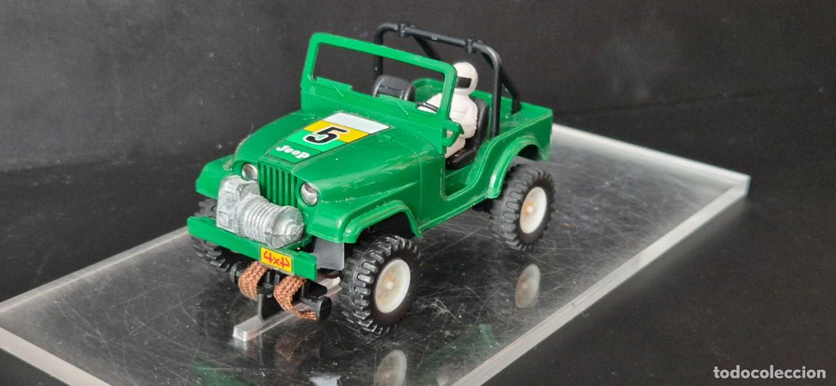 Scalextric: EXIN SCALEXTRIC STS JEEP VERDE BRAZO SUSPENSION DEL CHASIS ROTO, FALTA LUBRICAR Y REPARAR