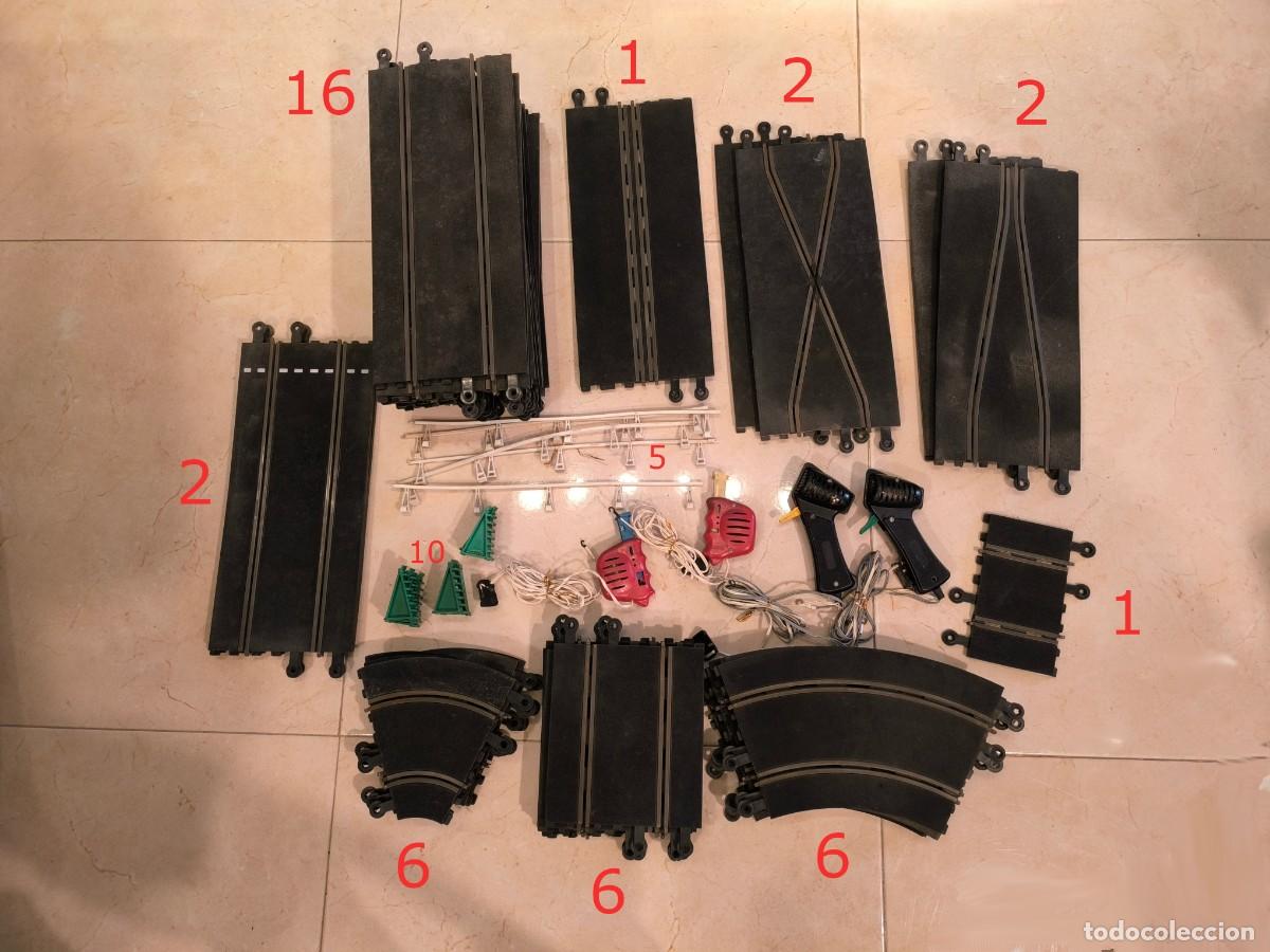 Scalextric: Lote de pistas Scalextric + 4 mandos vintage.