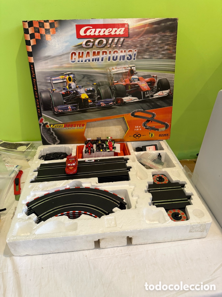 Scalextric: Carrera GO!!! Champions! 62265 circuito Slot 1:43 &ndash; 4 coches y accesorios &ndash; 2011