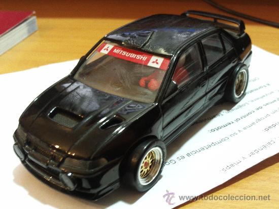 Scalextric: Mitusbishi Lancer EVO IV de Slot SCX - Foto 1