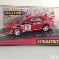 Scalextric: SLOT, SCALEXTRIC 6090, MITSUBISHI LANCER EVO VII WRC, Nº7, FRANÇOIS DELECOUR, 9º RALLY CATALUÑA 2002