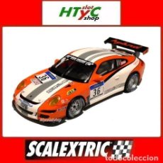 Scalextric: SCALEXTRIC PORSCHE 911 GT3 R HYBRID #36 NURBURGRING 2011 SCX U10395S300. Lote 306933903