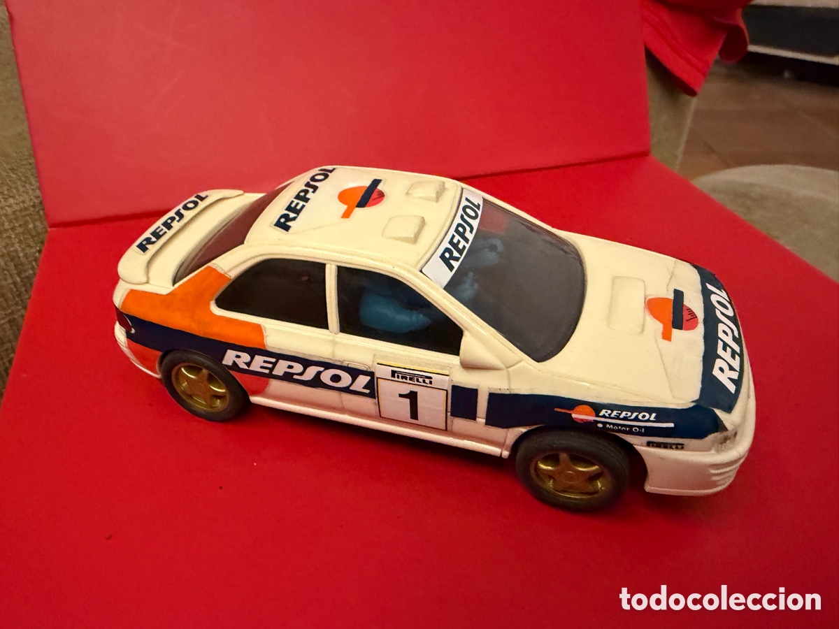 Scalextric: Subaru, Repsol N 1 Blanco naranja azul