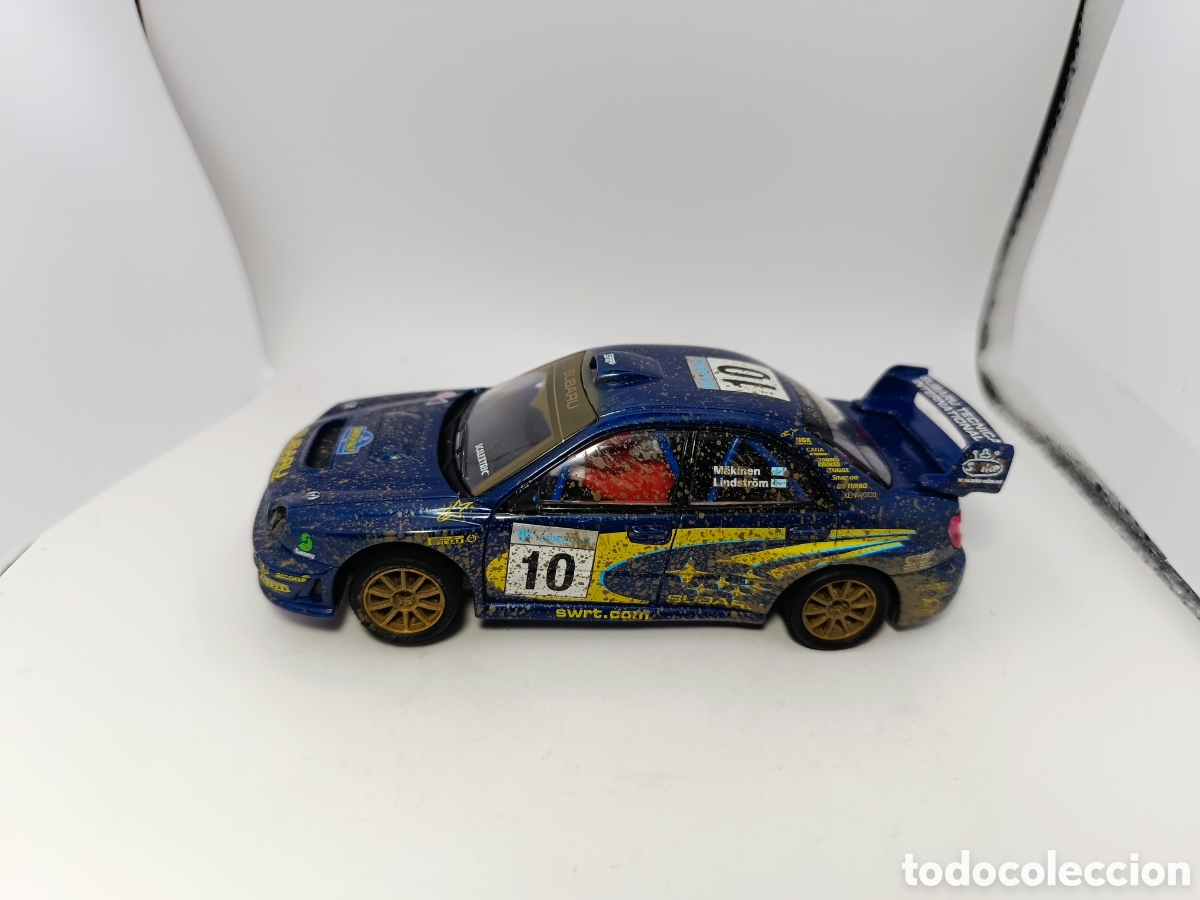 Scalextric: SCALEXTRIC SUBARU IMPREZA WRC MAKINEN EFECTO BARRO