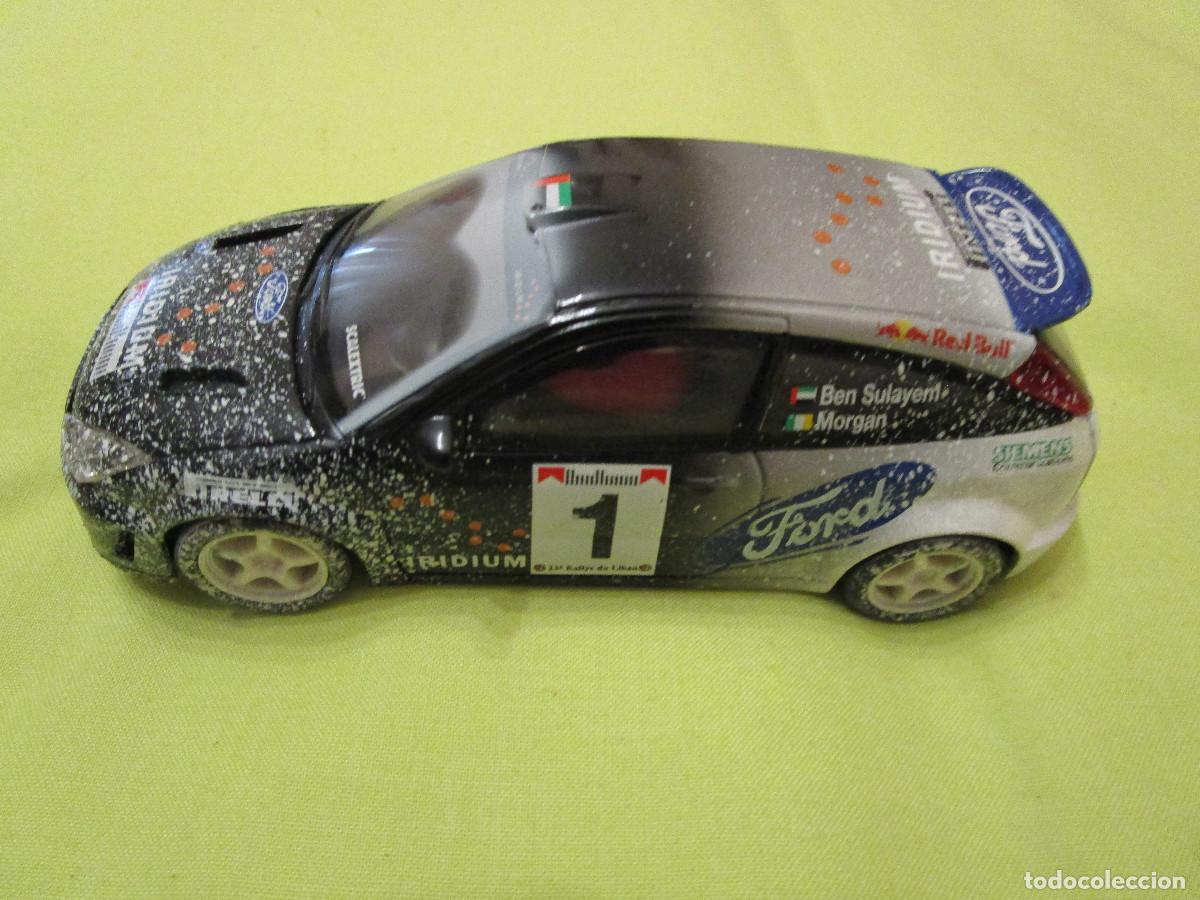 Scalextric: Coche de Slot Ford Focus WRC efecto nieve, de Scalextric Tecnotoys