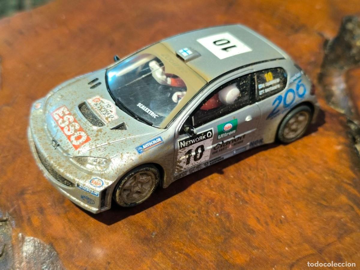Scalextric: SCALEXTRIC TECNITOYS: COCHE PEUGEOT 206 WRC EFECTO BARRO (GRONHUIM/RAUTIAINEN)