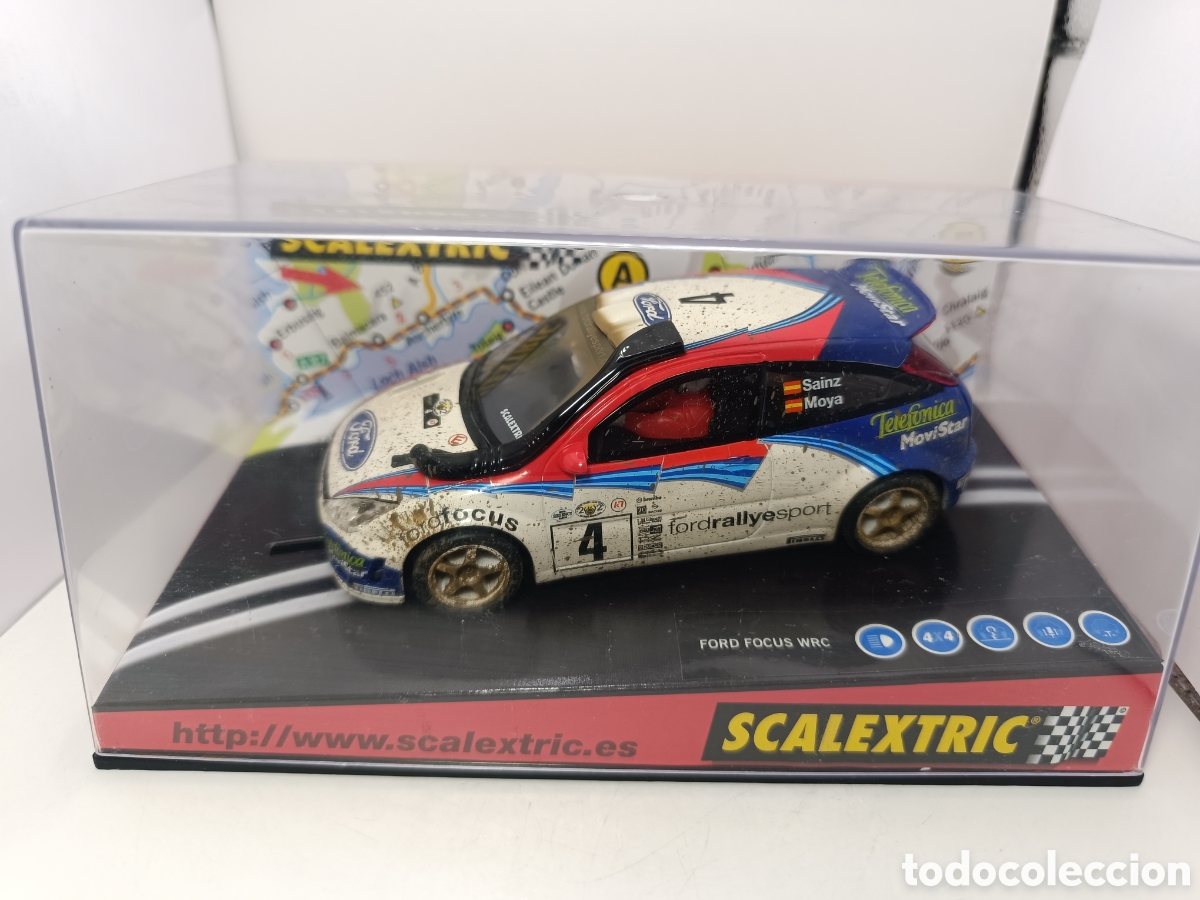 Scalextric: SCALEXTRIC FORD FOCUS WRC SAFARI EFECTO BARRO 6106