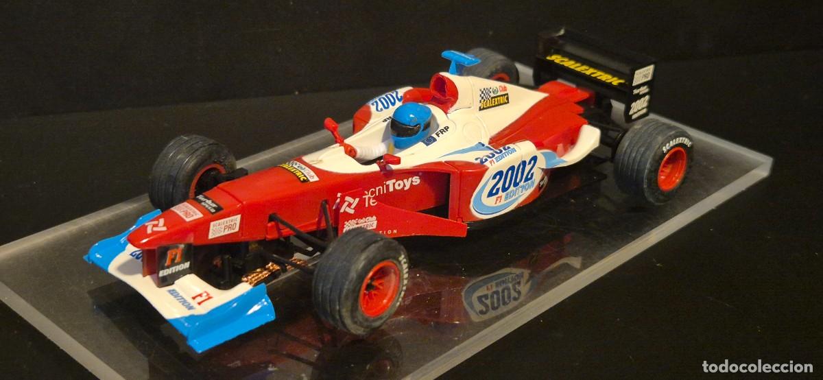 Scalextric: SCALEXTRIC F.1 2002 EDITION FUNCIONA BIEN UN POCO ABIERTO EL AGUJERO DONDE SE SUJETABA EL COCHE