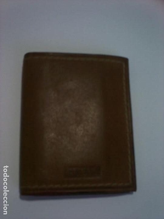 Segunda mano: CARTERA DE LA MARCA GUESS EN PIEL - Foto 1
