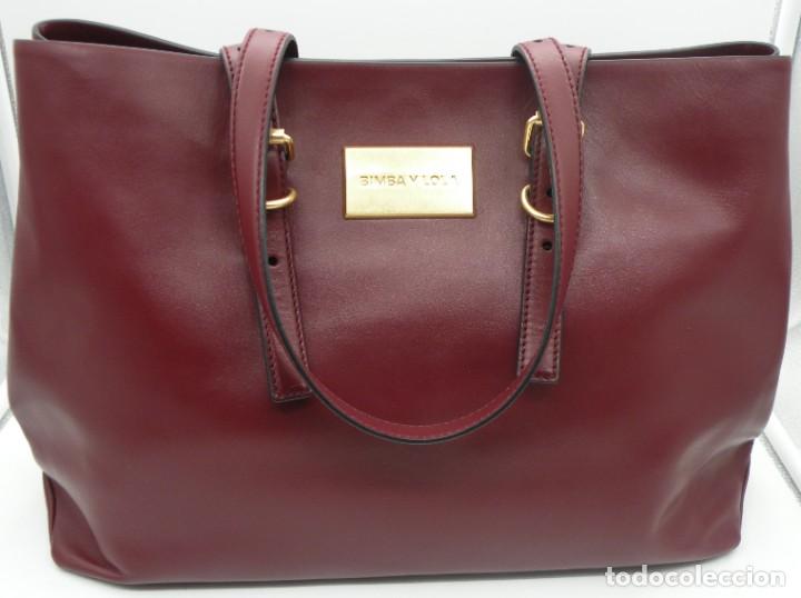 Bolso grande de piel burdeos original de bimba - Vendido en Subasta -  197375250